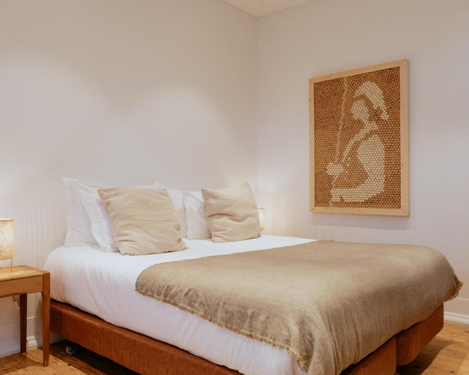 Postel nebo postele na pokoji v ubytování A Casa Brava