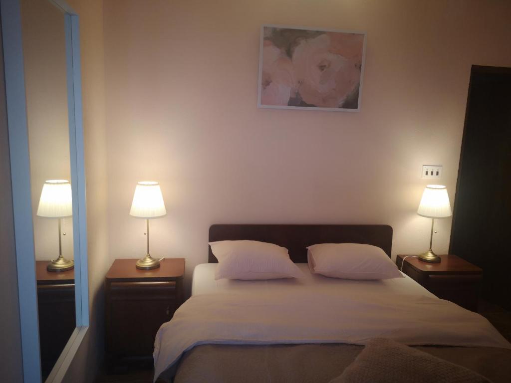 Postel nebo postele na pokoji v ubytování Holiday Home Betty