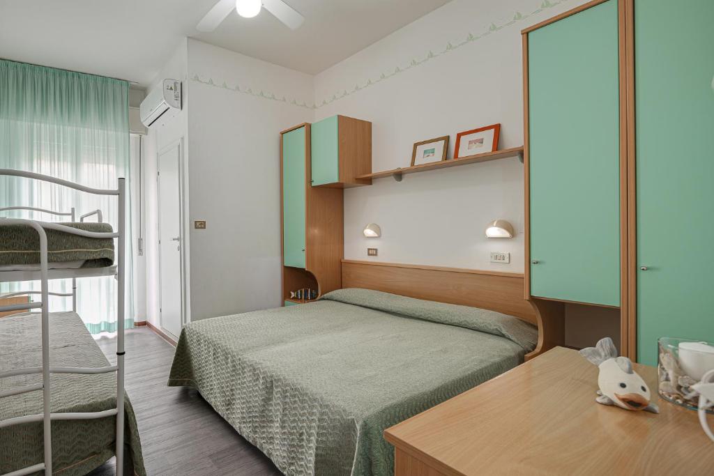 Postel nebo postele na pokoji v ubytování Hotel Gaia