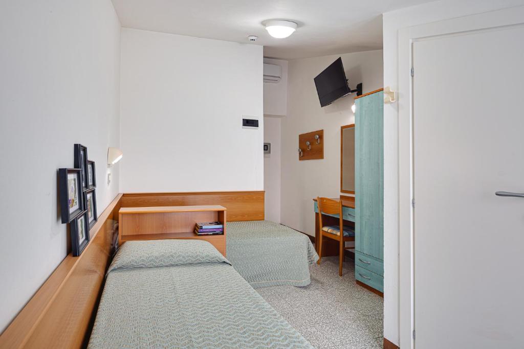 Postel nebo postele na pokoji v ubytování Hotel Gaia