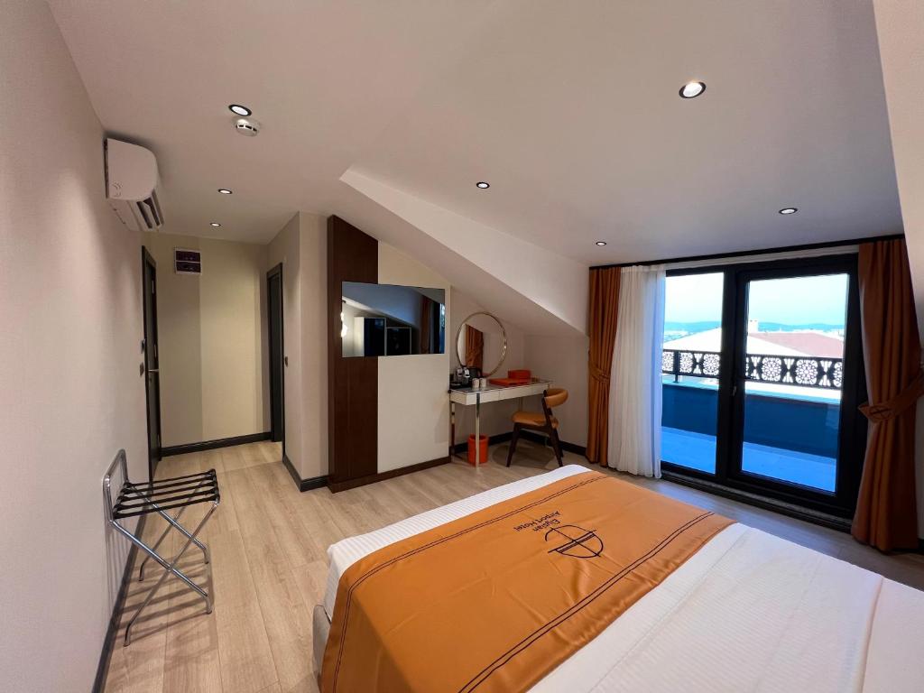 Letto o letti in una camera di Elysian Airport Hotel