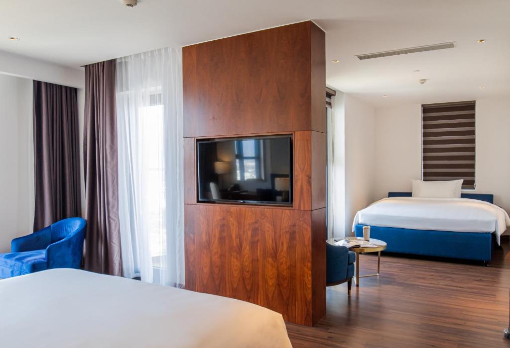 King Suite with Two King Beds with Balcony and Sea View