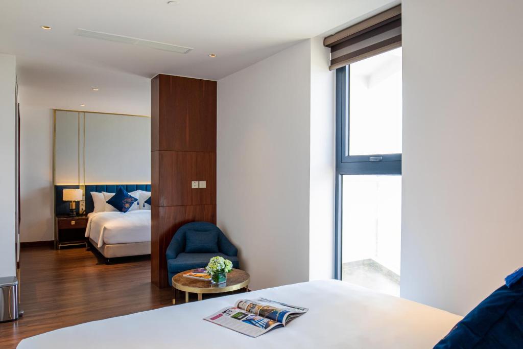 King Suite with Two King Beds with Balcony and Sea View