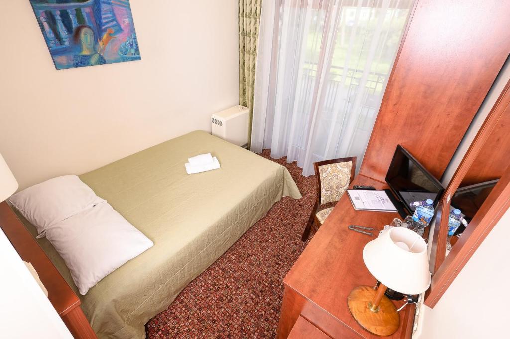 Postel nebo postele na pokoji v ubytování Regina