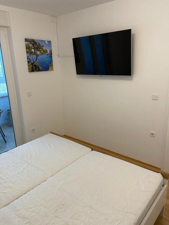 Postel nebo postele na pokoji v ubytování Apartment Kristian
