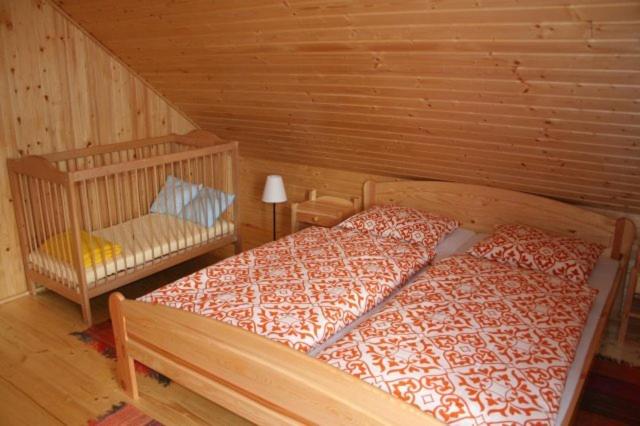 Posteľ alebo postele v izbe v ubytovaní Chata Devena