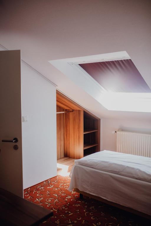 Postel nebo postele na pokoji v ubytování Hotel Dreieich