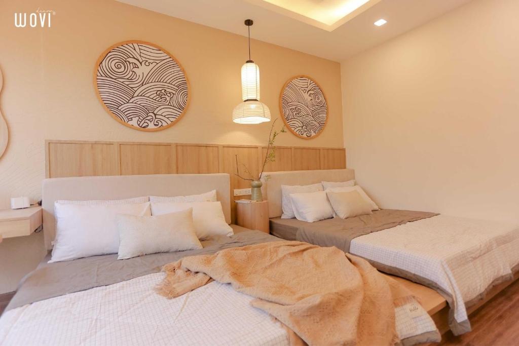 Postel nebo postele na pokoji v ubytování Tony Apartment -FLC Sea Tower Quy Nhon