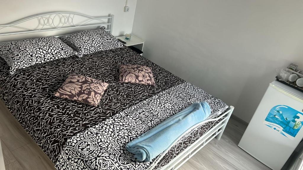 Postel nebo postele na pokoji v ubytování AMBIENT Geavidan 2