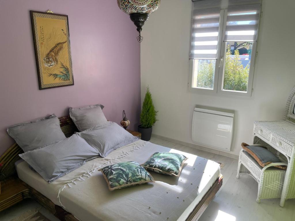 Postel nebo postele na pokoji v ubytování Maison de charme La Soleïade