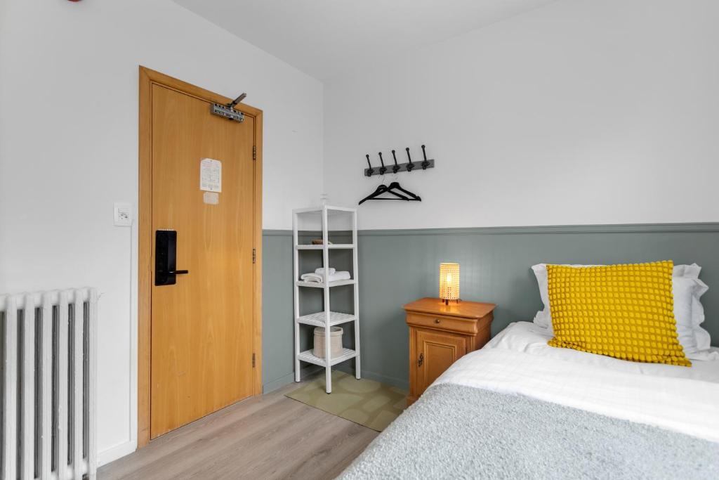 Postel nebo postele na pokoji v ubytování Flóki by Guesthouse Reykjavík
