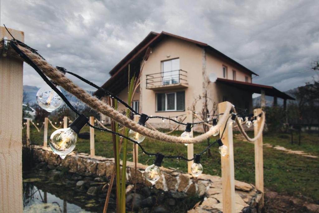 a house with a rope and a house at TheRefuge in Curtea de Argeş