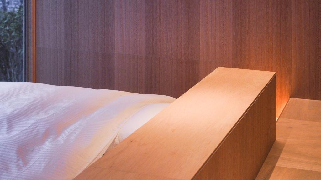Postel nebo postele na pokoji v ubytování cometa伊勢志摩の一番星Venusウィーナス