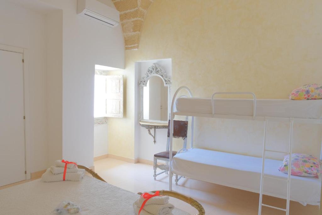 Postel nebo postele na pokoji v ubytování I Ricordi di Anna