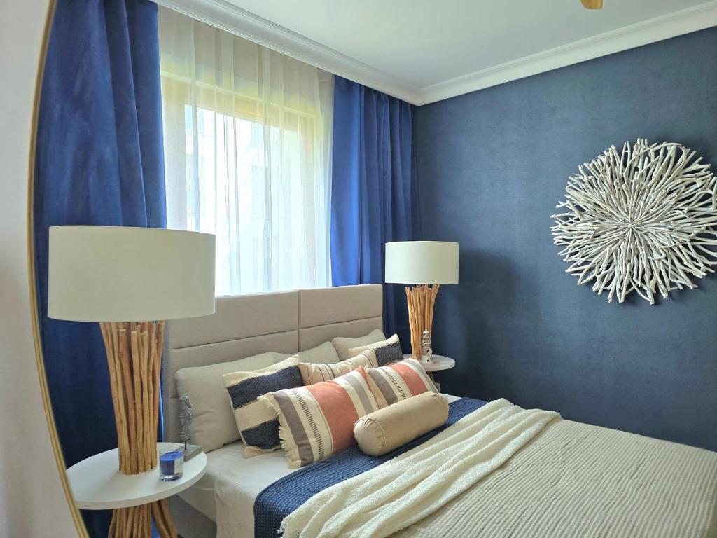 Posteľ alebo postele v izbe v ubytovaní MorzeApartament