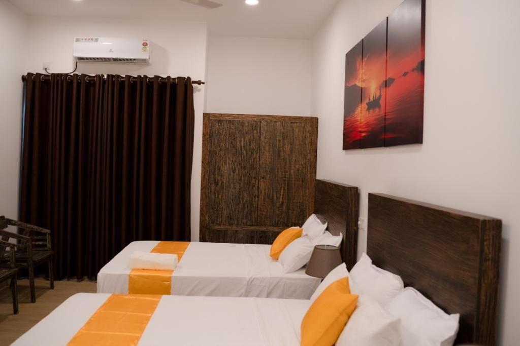 Postel nebo postele na pokoji v ubytování Lucky Transit Hotel - Katunayake Airport