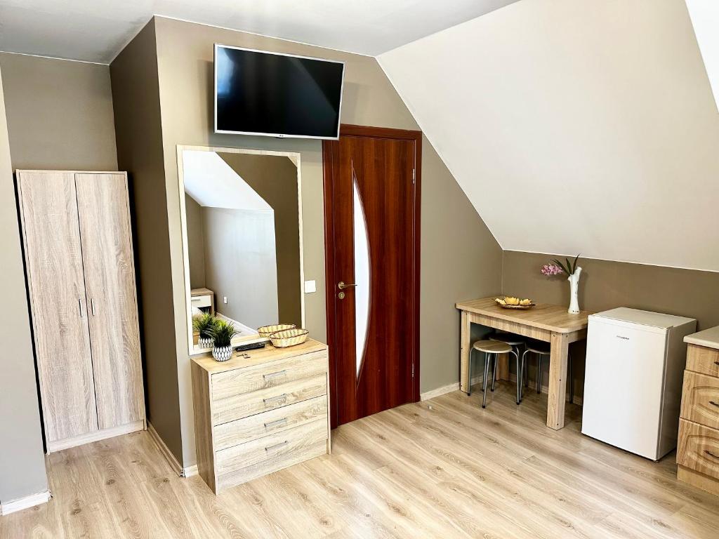 Kuchyň nebo kuchyňský kout v ubytování Villa Gāles Hotel