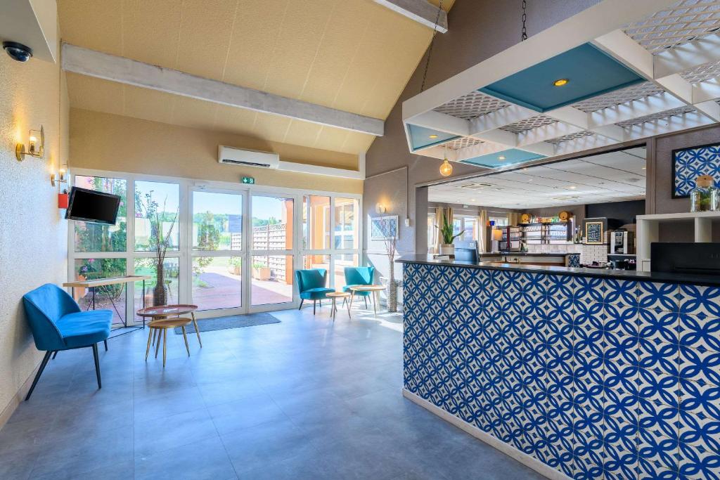 Posezení v ubytování Comfort Hotel Orleans Saran