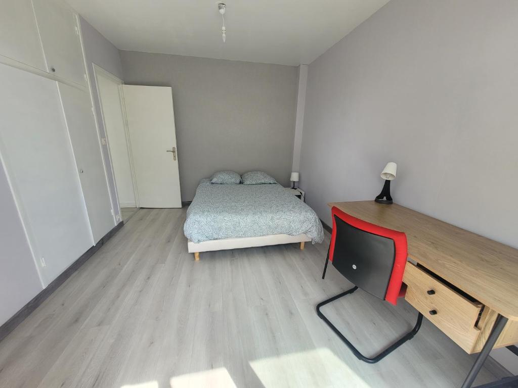 Postel nebo postele na pokoji v ubytování Appartement T4