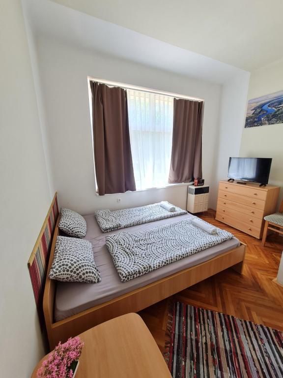 Postel nebo postele na pokoji v ubytování Tó Szálló