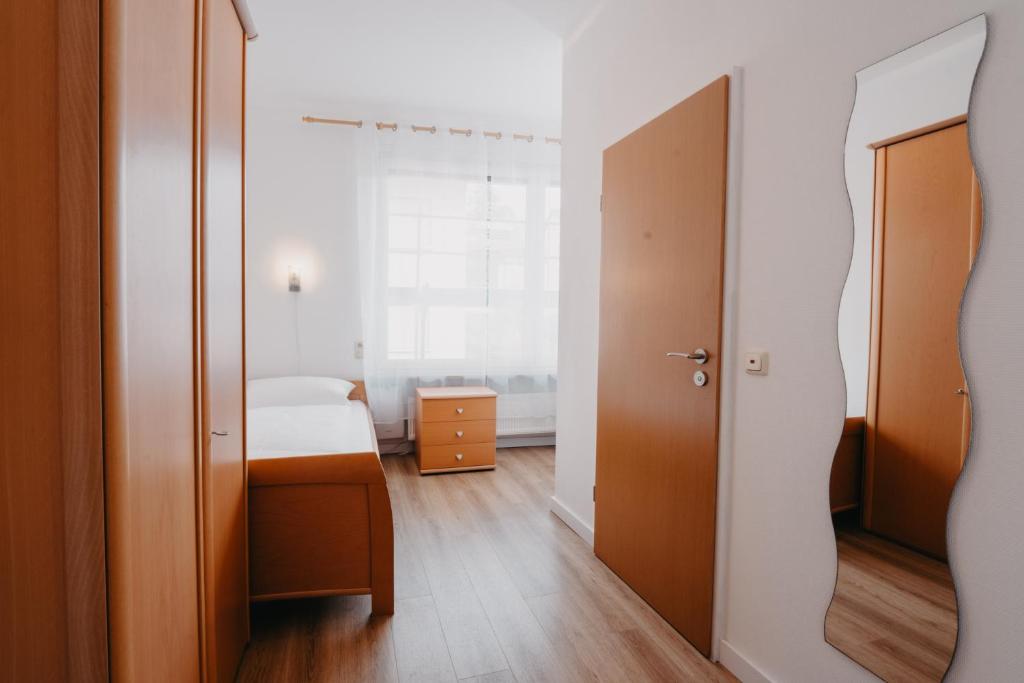 Postel nebo postele na pokoji v ubytování Hotel-Gasthof Zur Krone