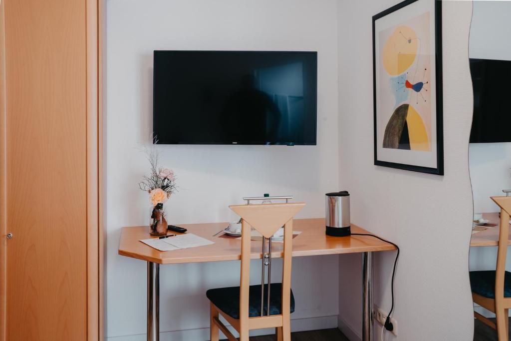 TV a/nebo společenská místnost v ubytování Hotel-Gasthof Zur Krone
