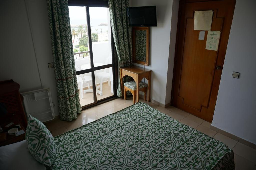 Postel nebo postele na pokoji v ubytování Hotel Zelis