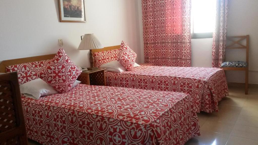 Postel nebo postele na pokoji v ubytování Hotel Zelis
