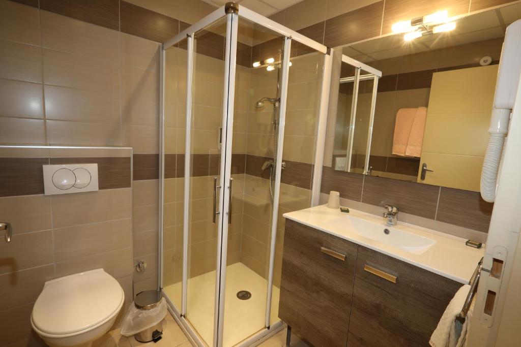 Koupelna v ubytování Hôtel Ardiden