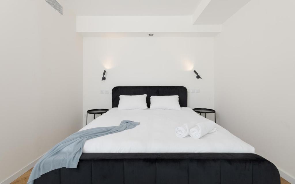 Letto o letti in una camera di סוויטות עם נוף צמודות לים במתחם SeaSide היוקרתי עם בריכה - By SEAELO EILAT