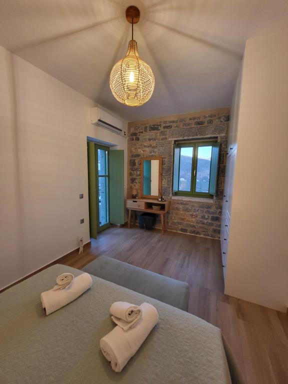 Postel nebo postele na pokoji v ubytování Casa Nostra Maisonette
