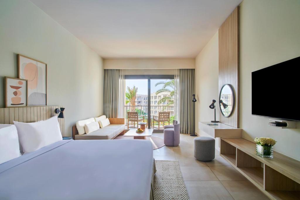 Postel nebo postele na pokoji v ubytování Marassi Boutique Hotel-Marina 2