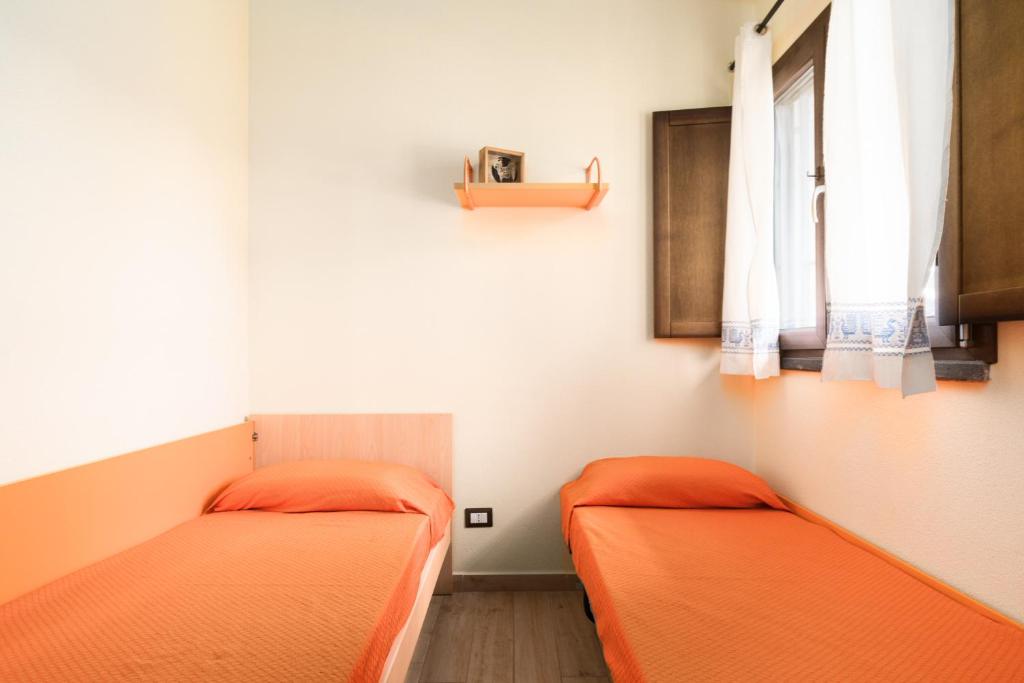 Łóżko lub łóżka w pokoju w obiekcie Casa Sole