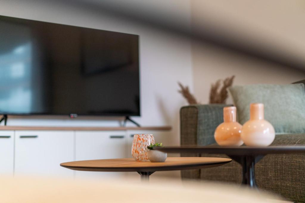 TV a/nebo společenská místnost v ubytování Paradisio II