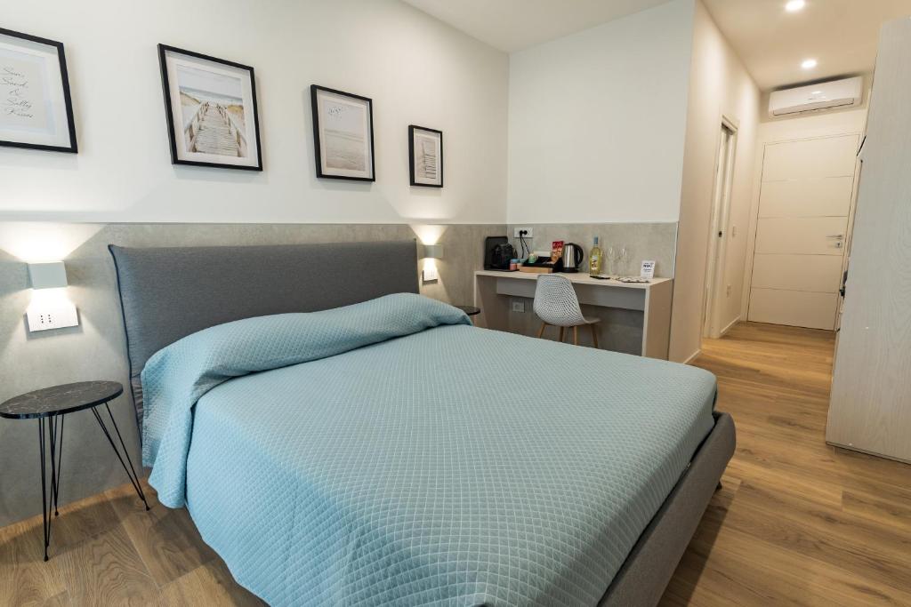Postel nebo postele na pokoji v ubytování Harbor Rooms - Cala Gonone