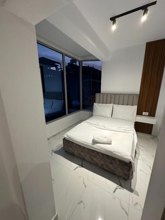 Postel nebo postele na pokoji v ubytování Hotel Elisabet