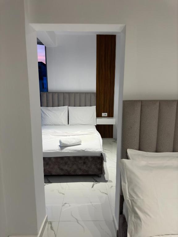 Postel nebo postele na pokoji v ubytování Hotel Elisabet
