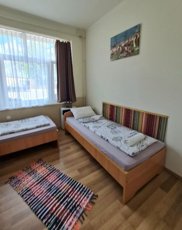 Postel nebo postele na pokoji v ubytování Tó Szálló