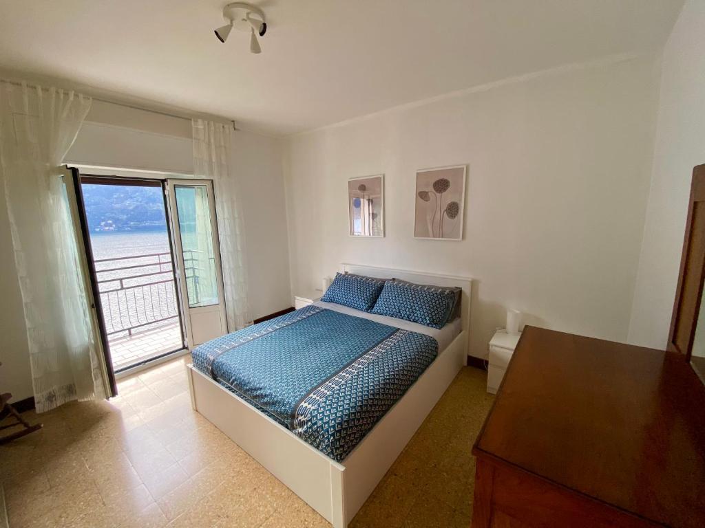 Postel nebo postele na pokoji v ubytování Casa Luciano