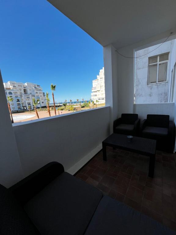 Posezení v ubytování Luxueux appartement avec vue mer & piscine