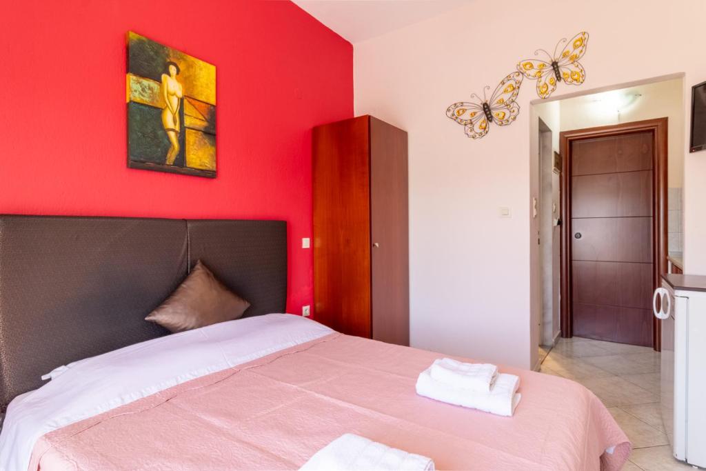 Posteľ alebo postele v izbe v ubytovaní Iliadis House II