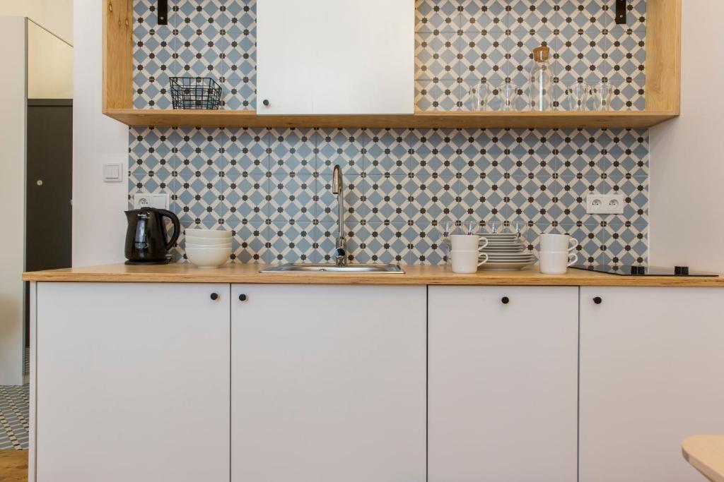 Kuchyňa alebo kuchynka v ubytovaní 19Rooms