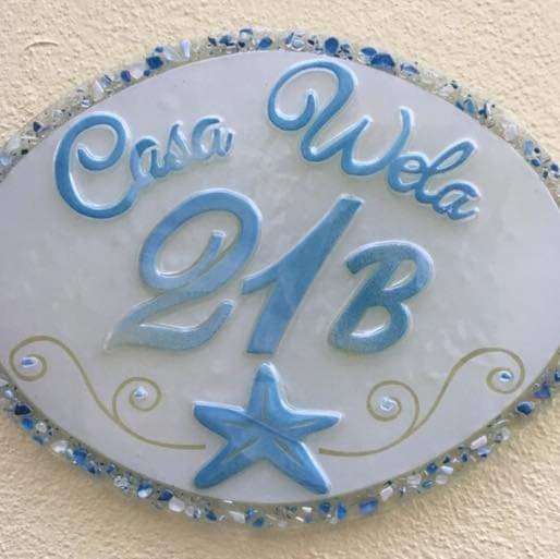 Certifikát, hodnocení, plakát nebo jiný dokument vystavený v ubytování casa Wela