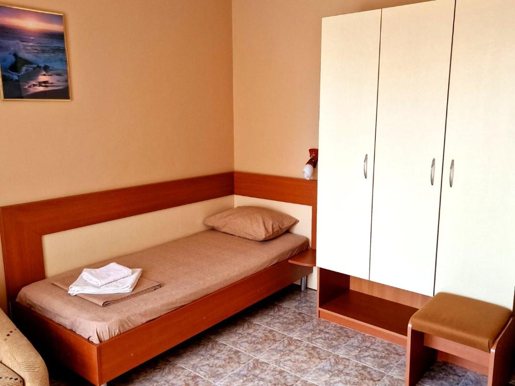 Postel nebo postele na pokoji v ubytování Къща за гости Карел