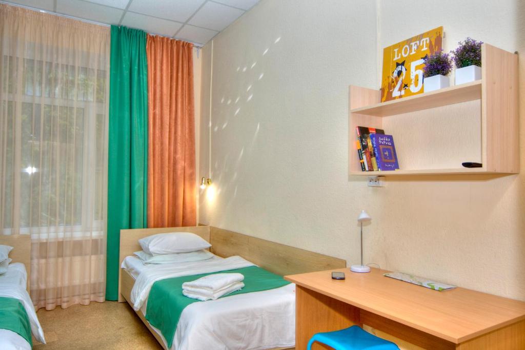 Posteľ alebo postele v izbe v ubytovaní Podolski Hostel