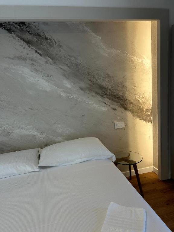 Postel nebo postele na pokoji v ubytování Albergo Panorama
