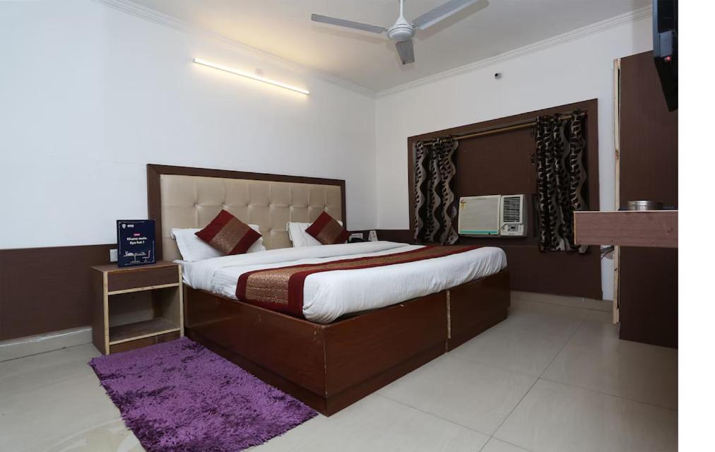 Postel nebo postele na pokoji v ubytování Vishal Hotel By Comfort Rooms