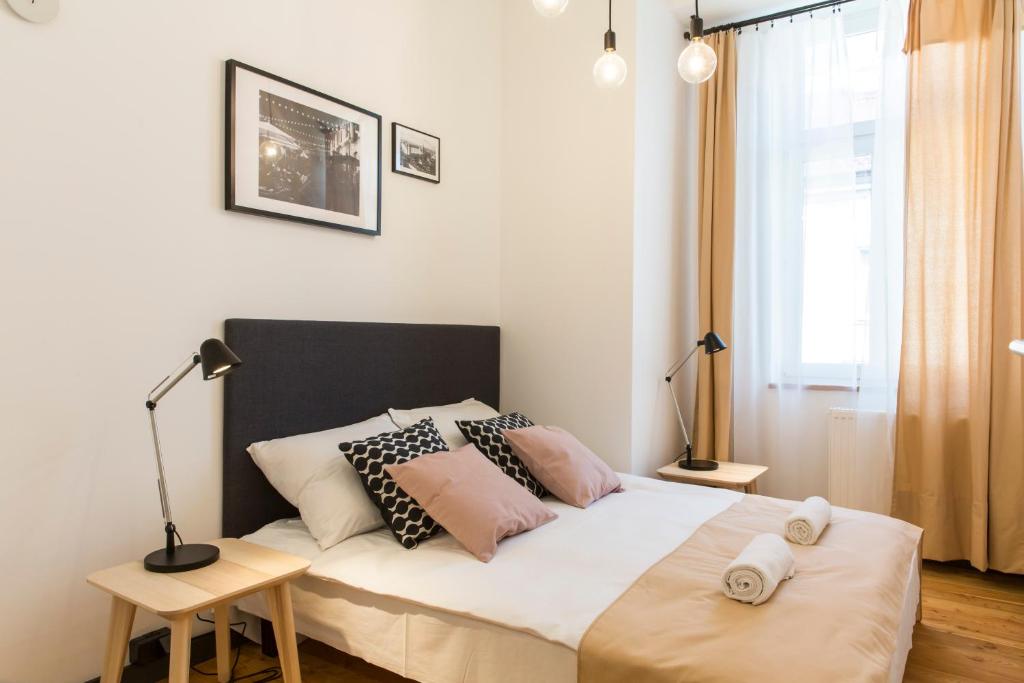 Posteľ alebo postele v izbe v ubytovaní 19Rooms