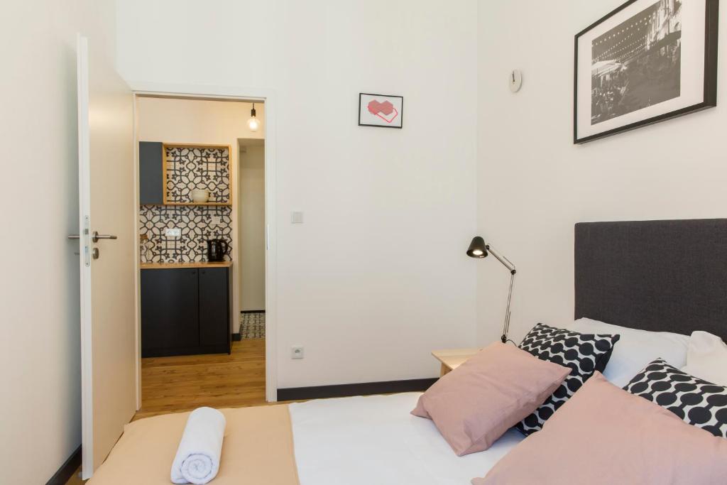 Posteľ alebo postele v izbe v ubytovaní 19Rooms