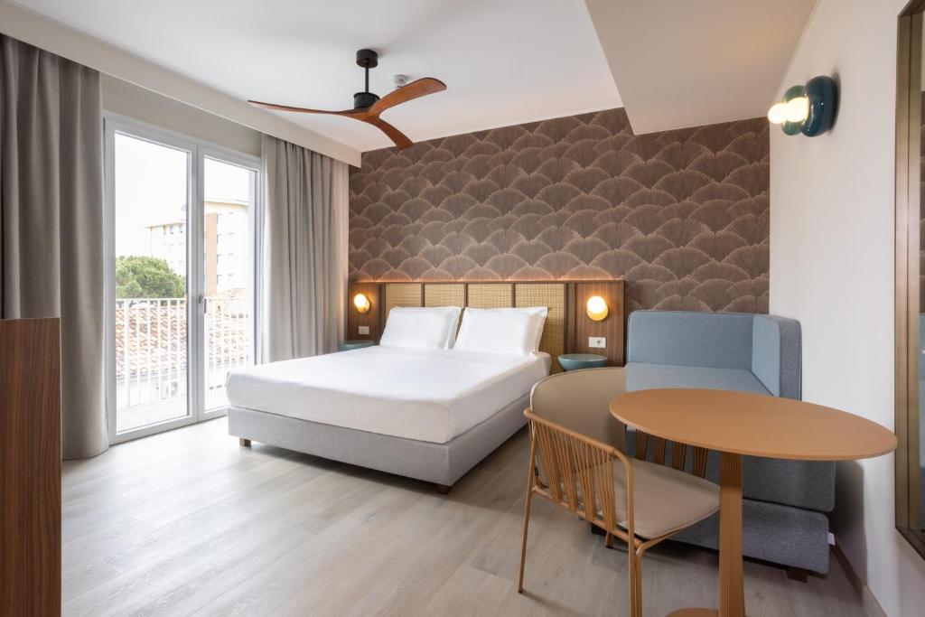 Postel nebo postele na pokoji v ubytování Hotel Diana
